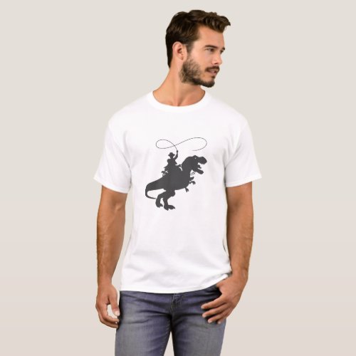 Cowboy riding dinosaur in the prehistoric era T_Shirt