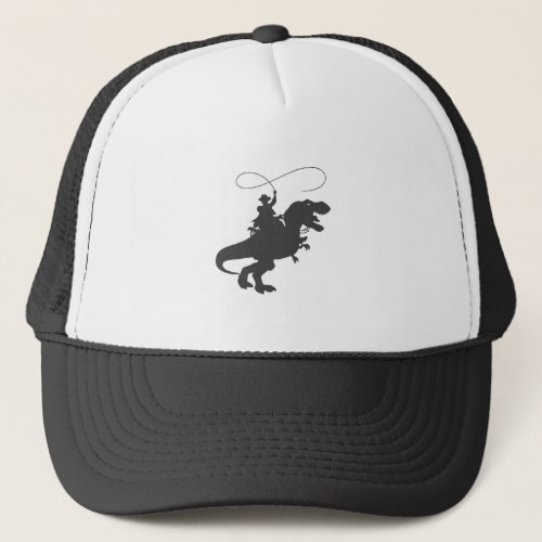 Cowboy riding dinosaur in the prehistoric era trucker hat