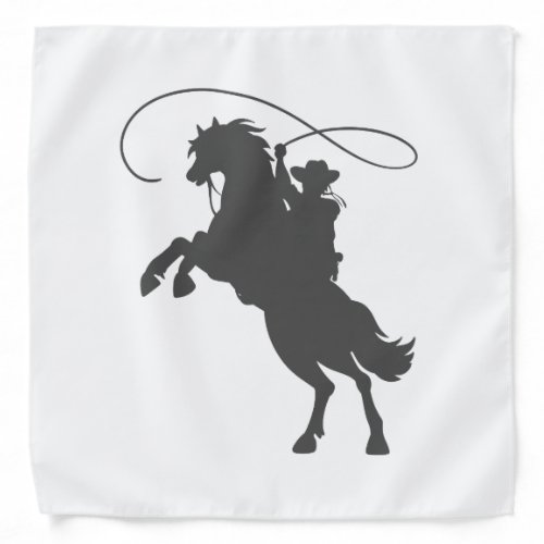 cowboy throwing lasso riding rearing up horse bandana