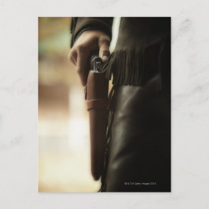 Cowboy with gun in holster postcard