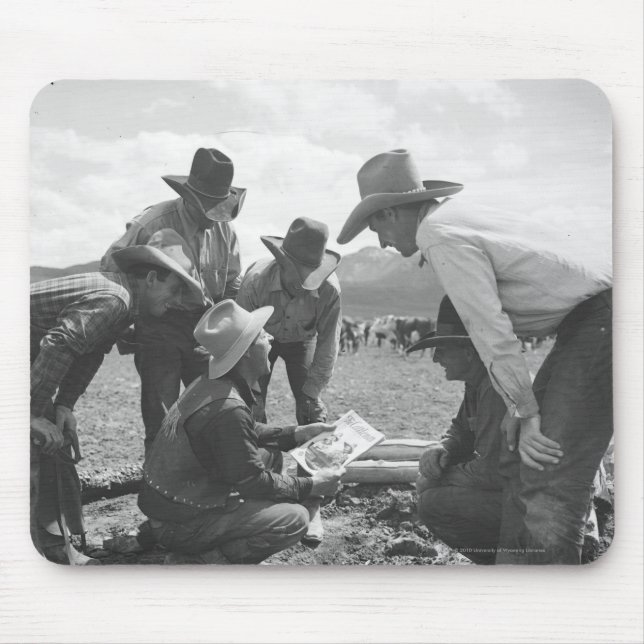 Cowboys looking a magazine mouse pad (Front)