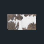 Cowhide. Checkbook Cover<br><div class="desc">A patch of decorative brown and white cowhide.</div>