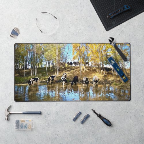 Cows in Autumn at the Pond Desk Mat
