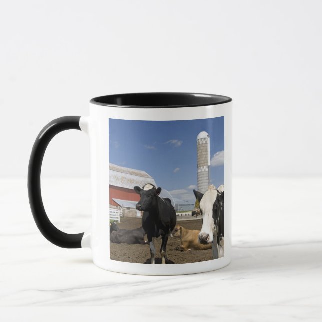 Cows in front of a red barn and silo on a farm mug (Left)