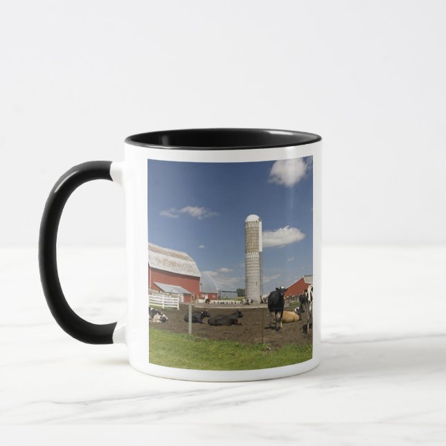 Cows in front of a red barn and silo on a farm mug (Left)