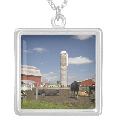 Cows in front of a red barn and silo on a farm silver plated necklace