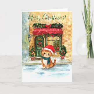 Cozy Christmas cat in snowy street Holiday Card