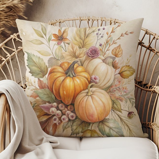 Cozy Fall Pumpkins and Berries Throw Pillow (Cozy Fall Pumpkins and Berries Throw Pillow in a boho rattan armchair.)