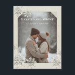 Cozy Snowflake married and bright couple photo Holiday Postcard<br><div class="desc">Celebrate the season in style with this customizable holiday postcard featuring a romantic and cozy snowy design decorated by delicate snowflakes and the sweet phrase “married and bright” Add your favorite photo and personalize it with names, dates, or a heartfelt message. It makes a charming way to celebrate your first...</div>
