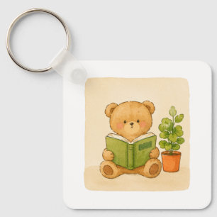 Cozy Teddy Bear Reading Book Keychain