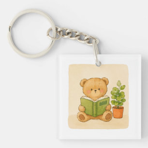 Cozy Teddy Bear Reading Book Keychain