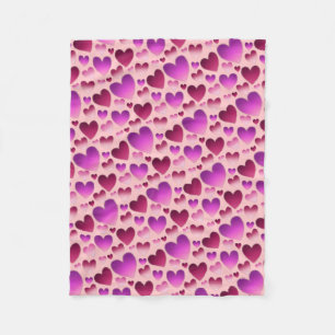 Cozy up under a blush «Meadow of hearts» Fleece Blanket