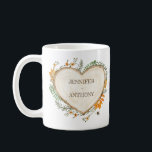Cozy Woodland Cottagecore Wood Heart Personalized Coffee Mug<br><div class="desc">Create a personalized gift for your special someone or for a special couple. This coffee mug features a watercolor illustration of a wooden heart surrounded by autumn leaves, flowers, greenery and a bee and is ready to be personalized with names or other text. The text and graphic appear on both...</div>