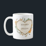 Cozy Woodland Cottagecore Wood Heart Personalized Coffee Mug<br><div class="desc">Create a personalized gift for your special someone or for a special couple. This coffee mug features a watercolor illustration of a wooden heart surrounded by autumn leaves, flowers, greenery and a bee and is ready to be personalized with names or other text. The text and graphic appear on both...</div>