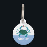 CRAB PET ID TAG<br><div class="desc">Set your pet's style apart with our Crab Pet ID Tag, the perfect accessory for the adventurous and spirited companion. The tag features a charming Louisiana blue crab illustration, symbolizing your pet's resilience and exploratory instincts. The sample name 'SCOUT' is prominently displayed against a calming blue background, ensuring that your...</div>