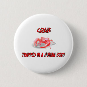 Crab trapped in a human body button