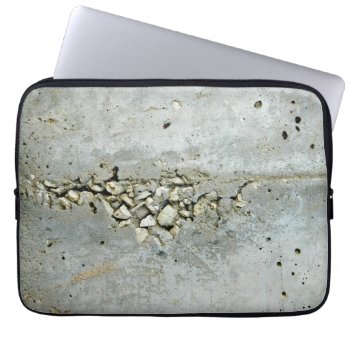 Cracked Concrete Wall With Small Stones Laptop Sleeve by YANKAdesigns at Zazzle