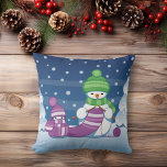 Crafty Snowman Knitting Scarf Throw Pillow<br><div class="desc">Vector illustration of two adorable cartoon snowmen dressed in knitted hats and scarves. The big crafty snowman is knitting an oversized scarf for the little one. The scarf is already wrapped several times around the cute little snowman.</div>