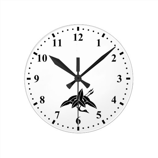 Crane-shaped arrowhead round clock | Zazzle