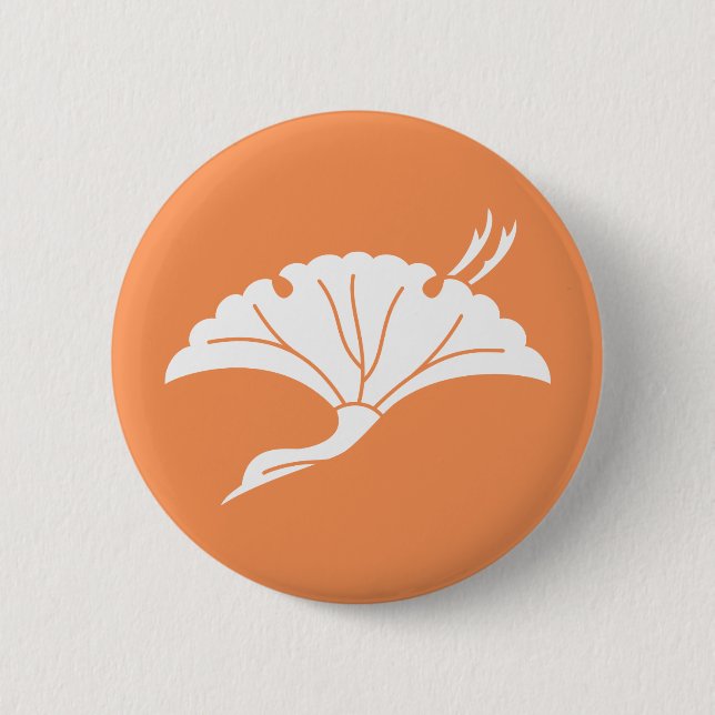Crane-shaped ginkgo leaf pinback button (Front)