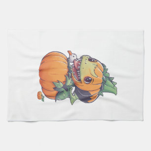 crazy pumpkin trying to eat spooky kitchen towel