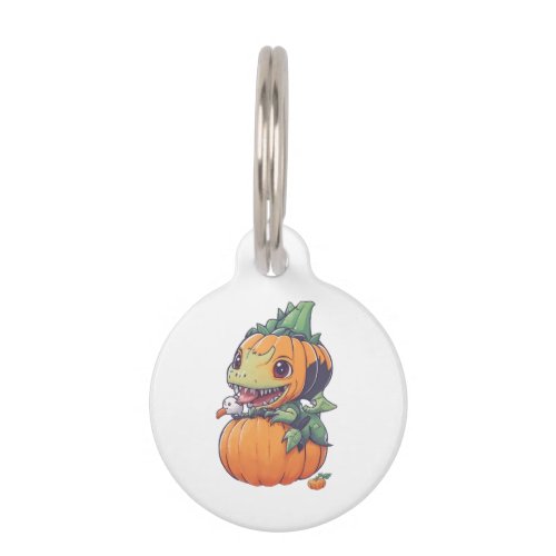 crazy pumpkin trying to eat spooky  pet ID tag