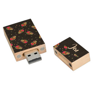 Crazy skulls on black wood flash drive