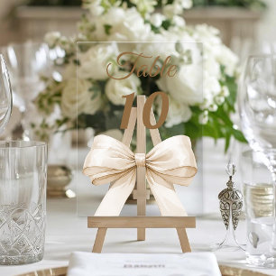 Cream bow acrylic table number sign