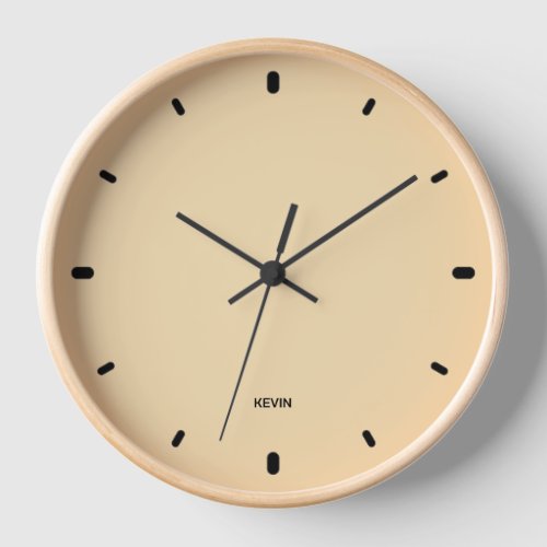 Cream color clock face  black hours and numbers