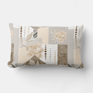 Cream flowers on white lumbar pillow