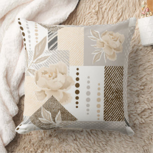 Cream flowers on white throw pillow