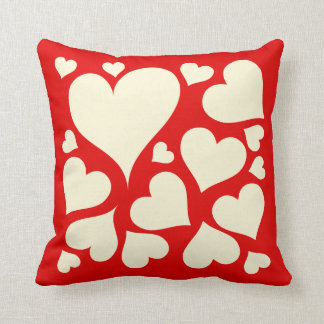 Cream hearts on red love pillow