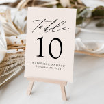 Cream Modern Elegance Wedding Table Number<br><div class="desc">Trendy, minimalist wedding table number cards featuring black modern lettering with "Table" in modern calligraphy script. The design features a creamy beige background or a color of your choice. The design repeats on the back. To order the table cards: add your name, wedding date, and table number. Add each number...</div>