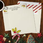 Cream Peppermint Stripe Holly Elegant Christmas Envelope<br><div class="desc">This simple, elegant cream envelope features red and cream peppermint stripes and a faux gold paint splatter on the inside and the outside is accented with a hand painted artsy holly and berries design and has just the right vintage touch. This trendy minimalist envelope is a beautiful addition to your...</div>