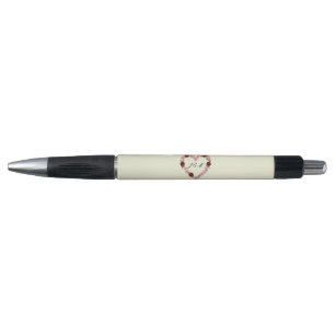 Cream with a pink and red floral center pen
