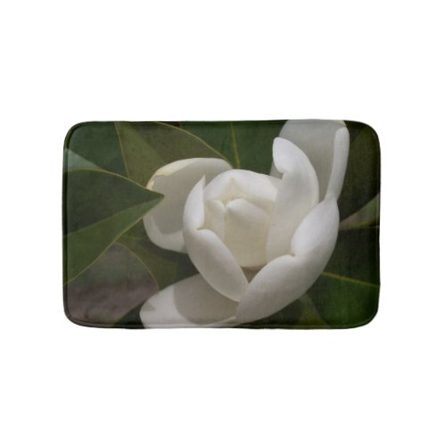 Creamy white magnolia flower bud bathroom mat