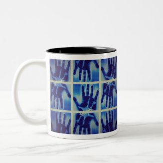 creepy blue hand Two-Tone coffee mug