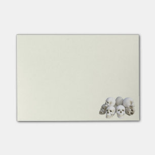 Creepy skulls pile post-it notes