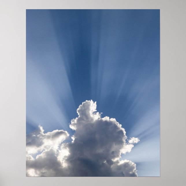 Crepuscular or God's rays streak past cloud. Poster (Front)