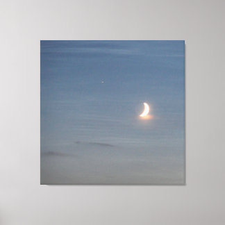 Crescent Moon On a Sealike Sky Canvas Print