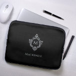 Crest Black Gray Monogram Name Vintage Monochrome Laptop Sleeve<br><div class="desc">A black and silver design with the monogram initial in a vintage crest, recommended for a man. The crest is faux silver foil, the background is black. Under the crest there is the name in gray caps. The vintage floral crest from an old book cover binding, of the book "Rust,...</div>