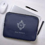 Crest Navy Blue Vintage Elegant Monogram and Name Laptop Sleeve<br><div class="desc">A navy blue and silver design with the monogram initial in a vintage crest, recommended for a man. The crest is faux silver foil, the background is navy blue. Under the crest there is the name in gray caps. The vintage floral crest from an old book cover binding, of the...</div>