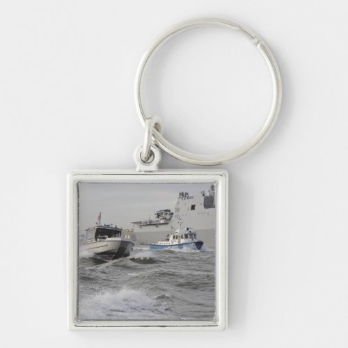 Crews from the coast guard and police departmen keychain