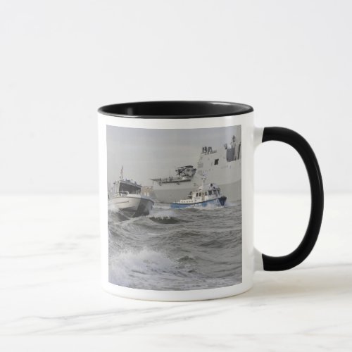 Crews from the coast guard and police departmen mug