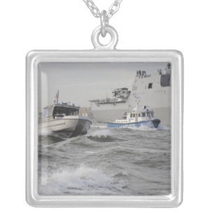 Crews from the coast guard and police departmen silver plated necklace