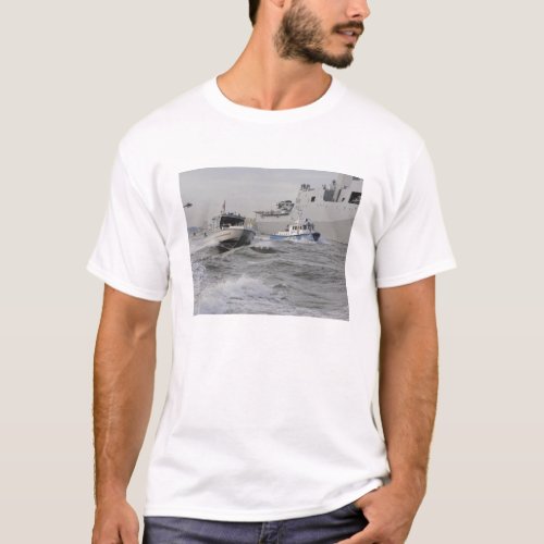 Crews from the coast guard and police departmen T_Shirt