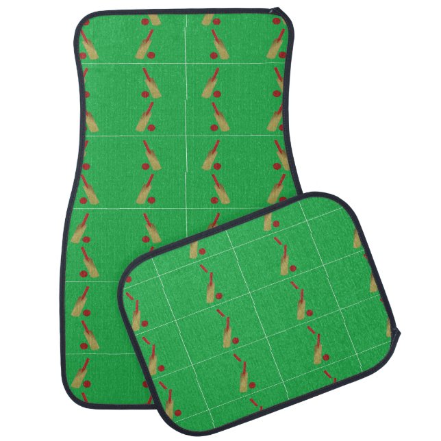 Cricket bat and ball on green car floor mat (Set)