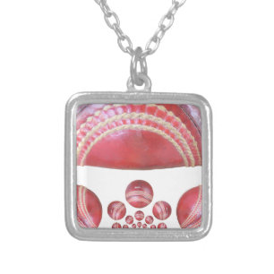 Crimson Spin – A Beautiful Red Cricket Ball Arti Silver Plated Necklace