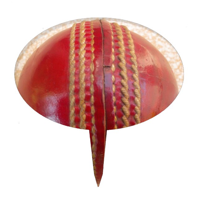 Crimson Stitch Focus: Close-Up of Cricket's Heart Cake Topper (Front)