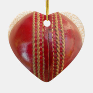 Crimson Stitch Focus: Close-Up of Cricket's Heart Ceramic Ornament